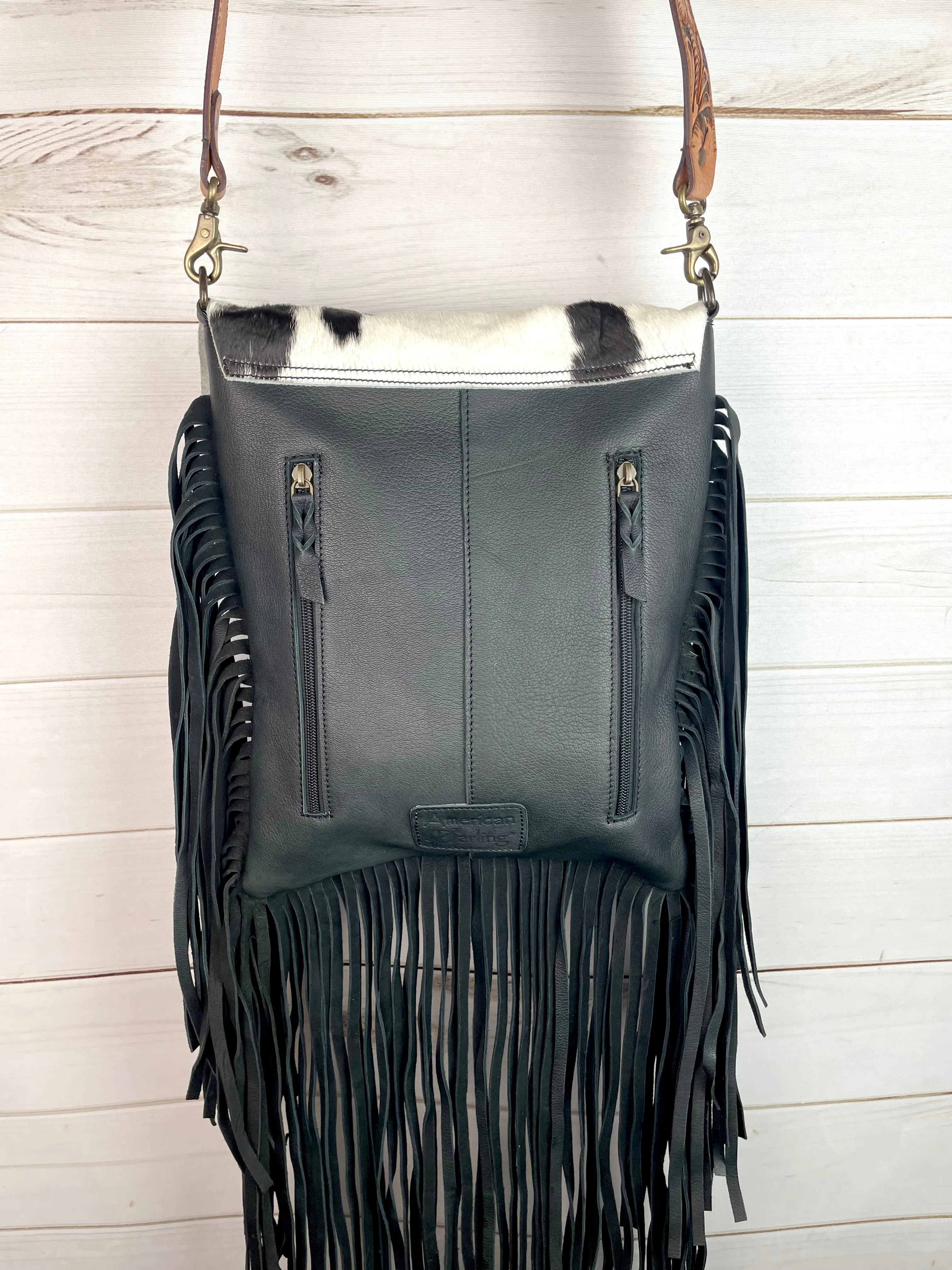 Black and White Raw Hide Flap on Black Leather with Fringe Crossbody Bag