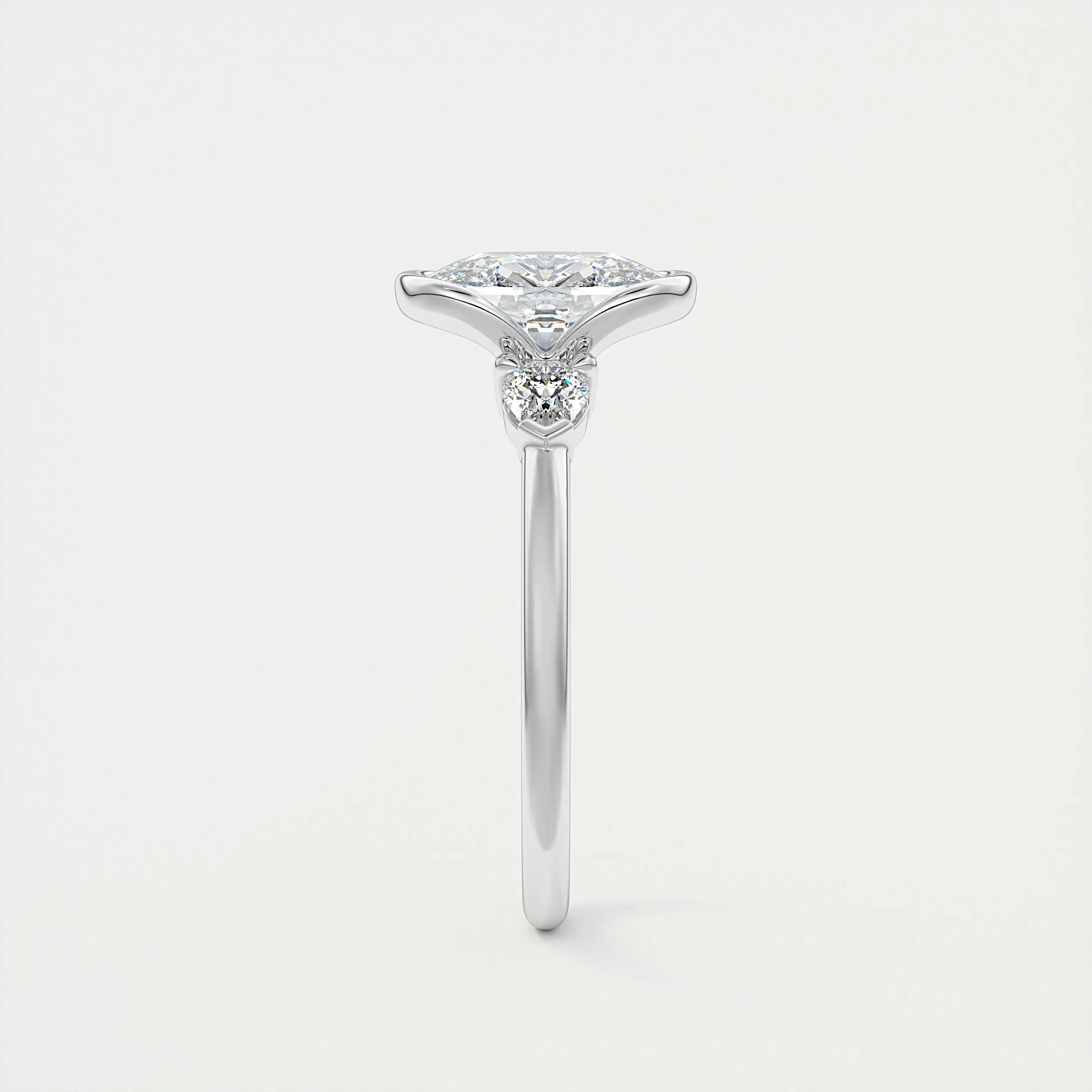 Clutch Three Stone | Elongated Cushion & Pears