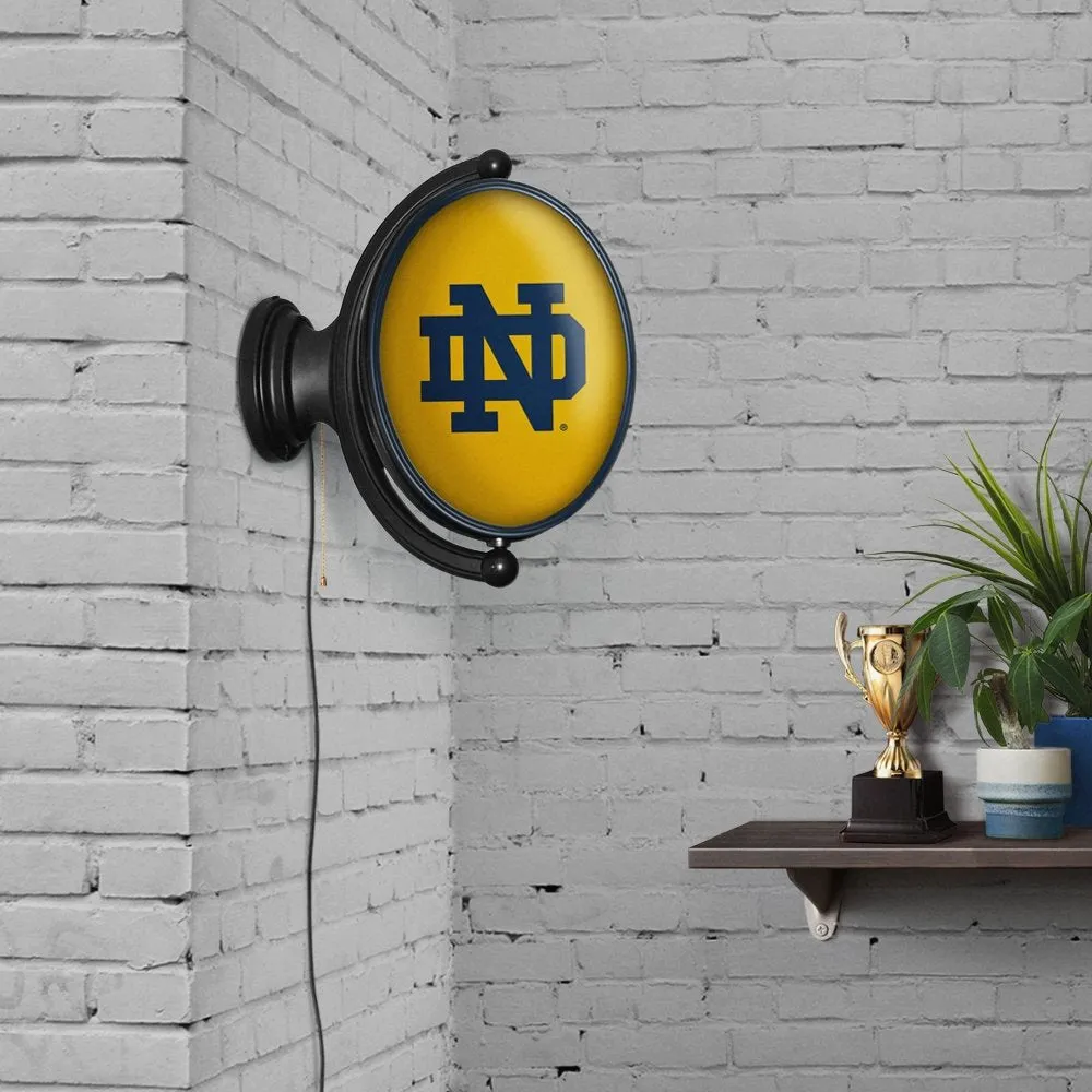 Notre Dame Fighting Irish: Original Oval Rotating Lighted Wall Sign