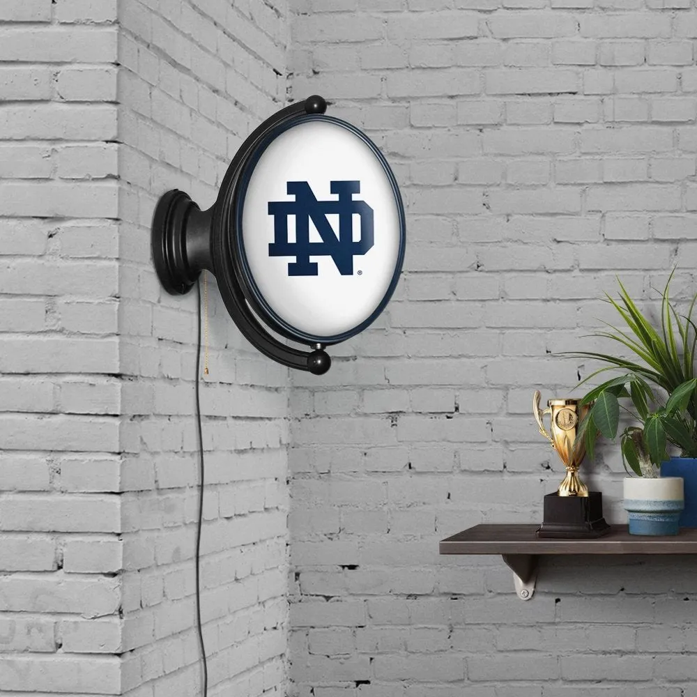 Notre Dame Fighting Irish: Original Oval Rotating Lighted Wall Sign