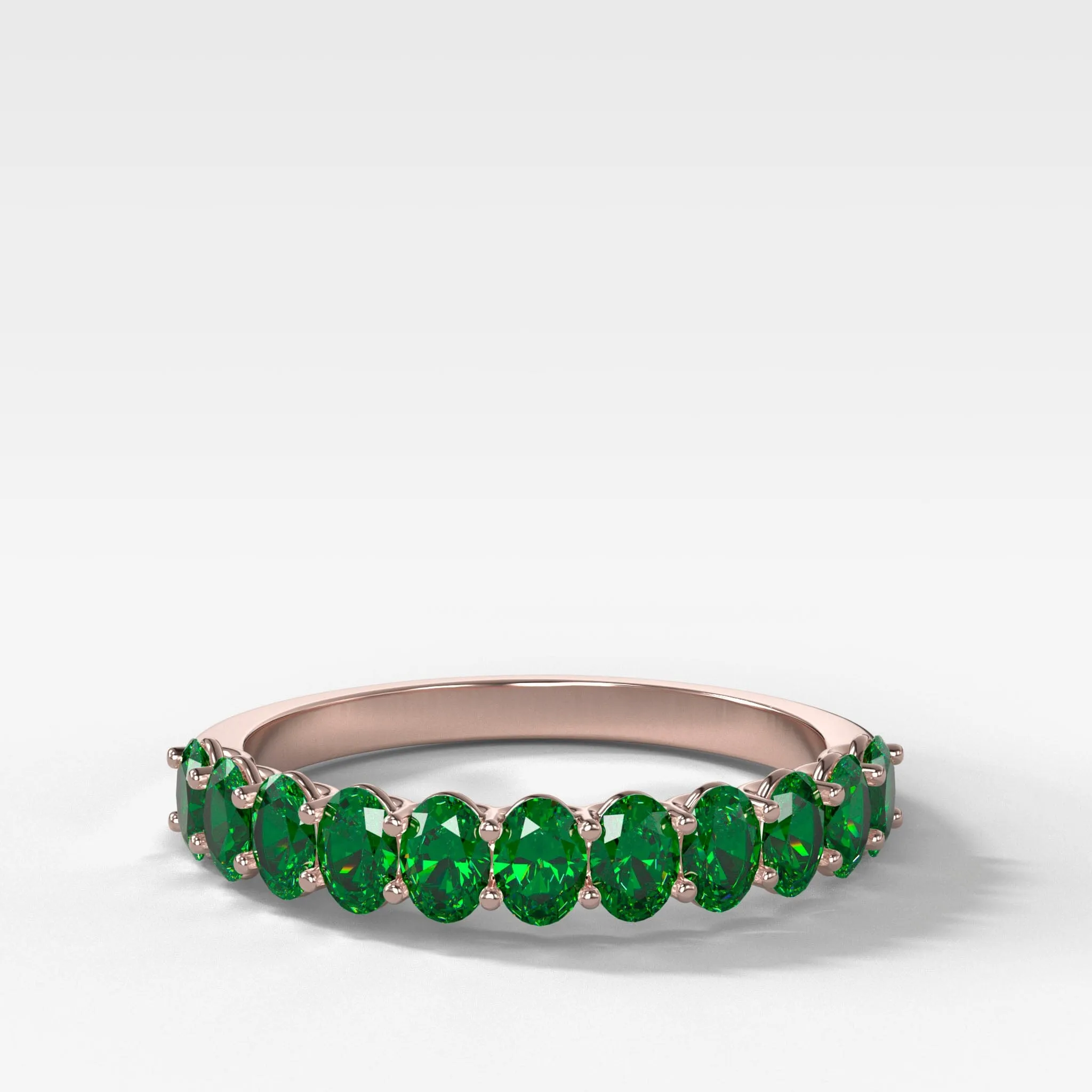 Petite Shared Prong Wedding Band with Green Emerald Oval Gemstones