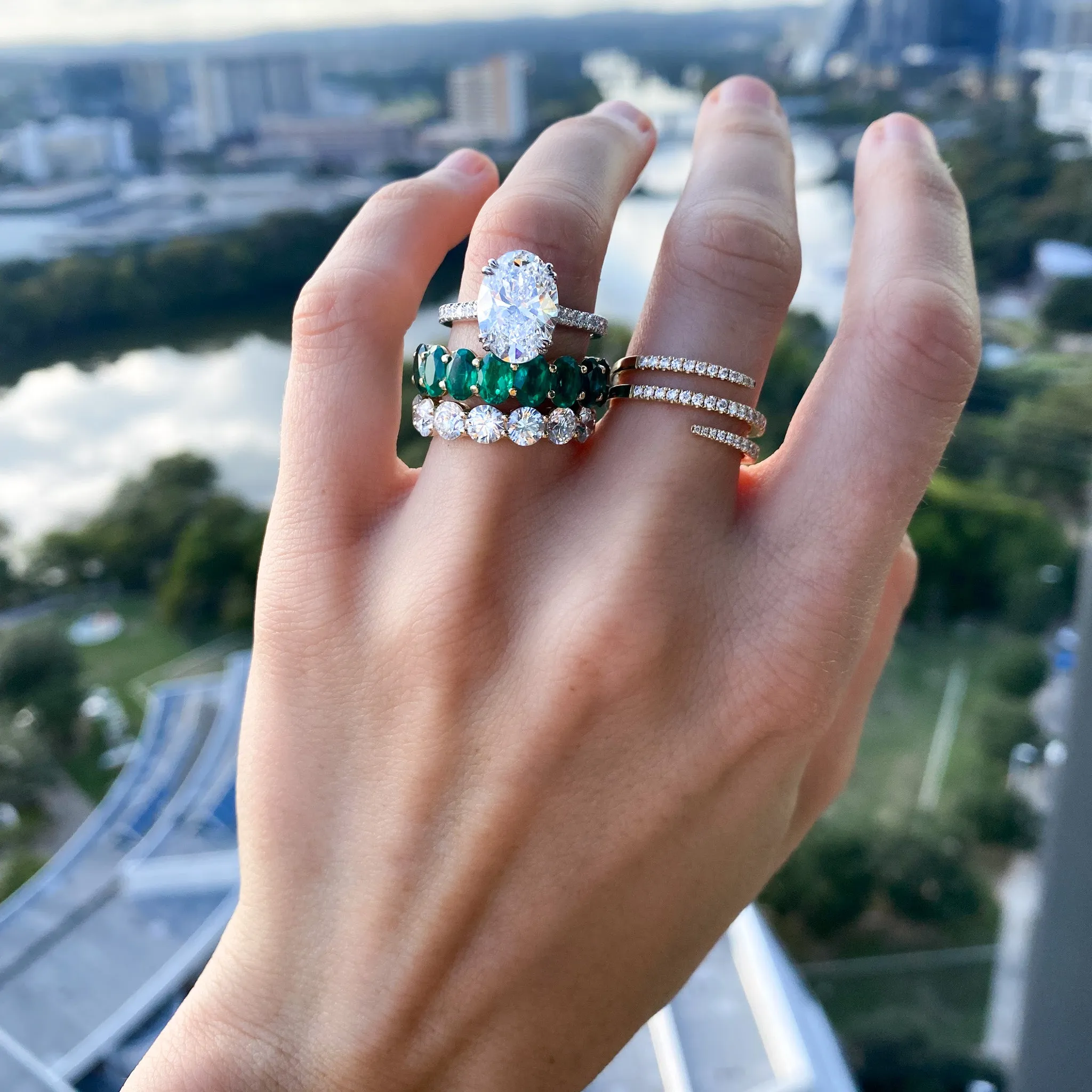 Petite Shared Prong Wedding Band with Green Emerald Oval Gemstones