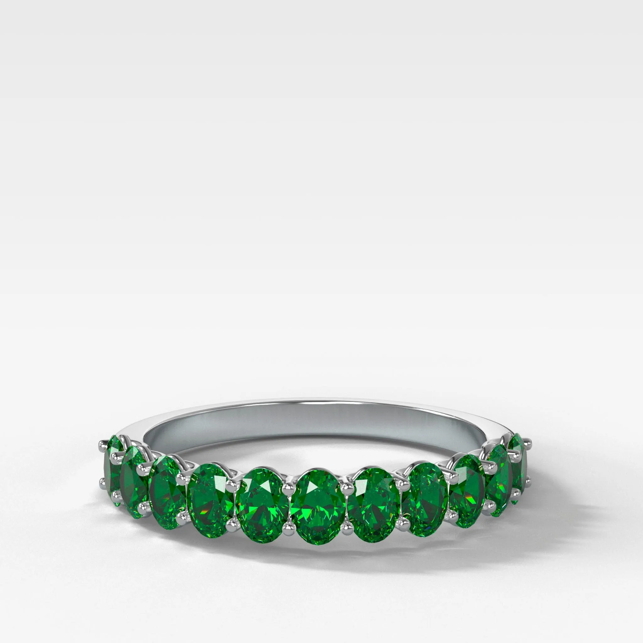 Petite Shared Prong Wedding Band with Green Emerald Oval Gemstones