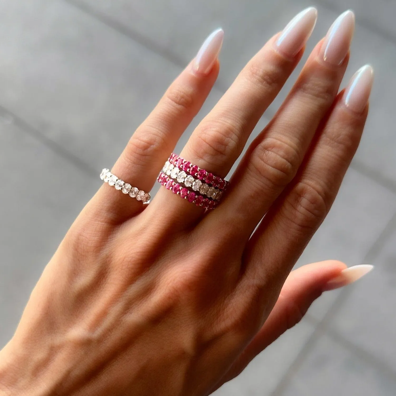 Petite Shared Prong Wedding Band with Red Ruby Oval Gemstones