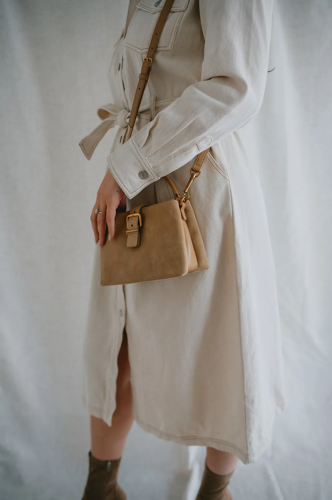 The Charly Mini Buckle Bag by Dolce Vita - Tan Suede