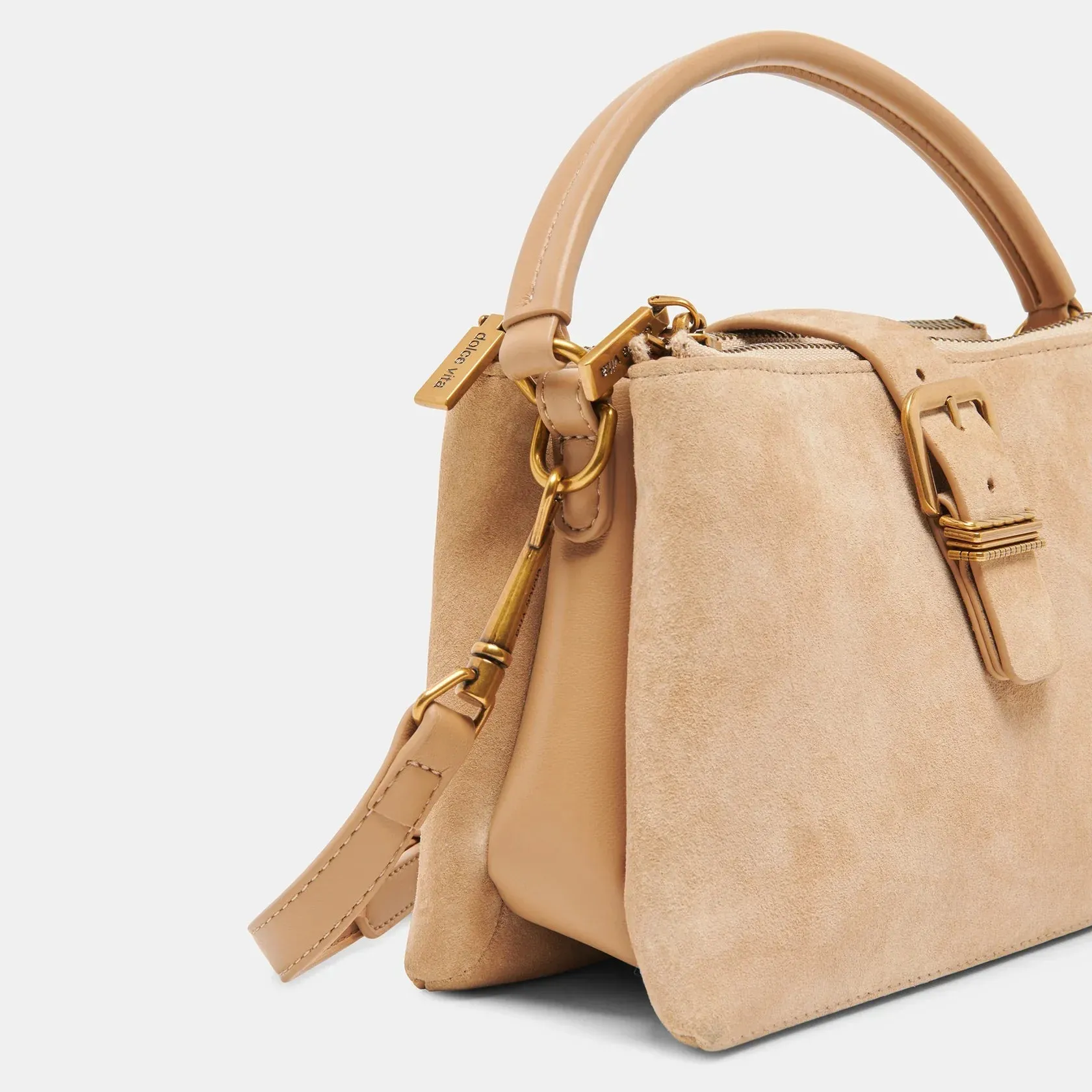 The Charly Mini Buckle Bag by Dolce Vita - Tan Suede
