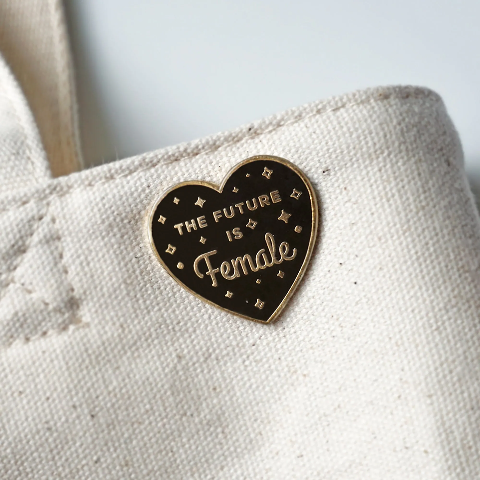 The Future is Female Black Lapel Enamel Pin